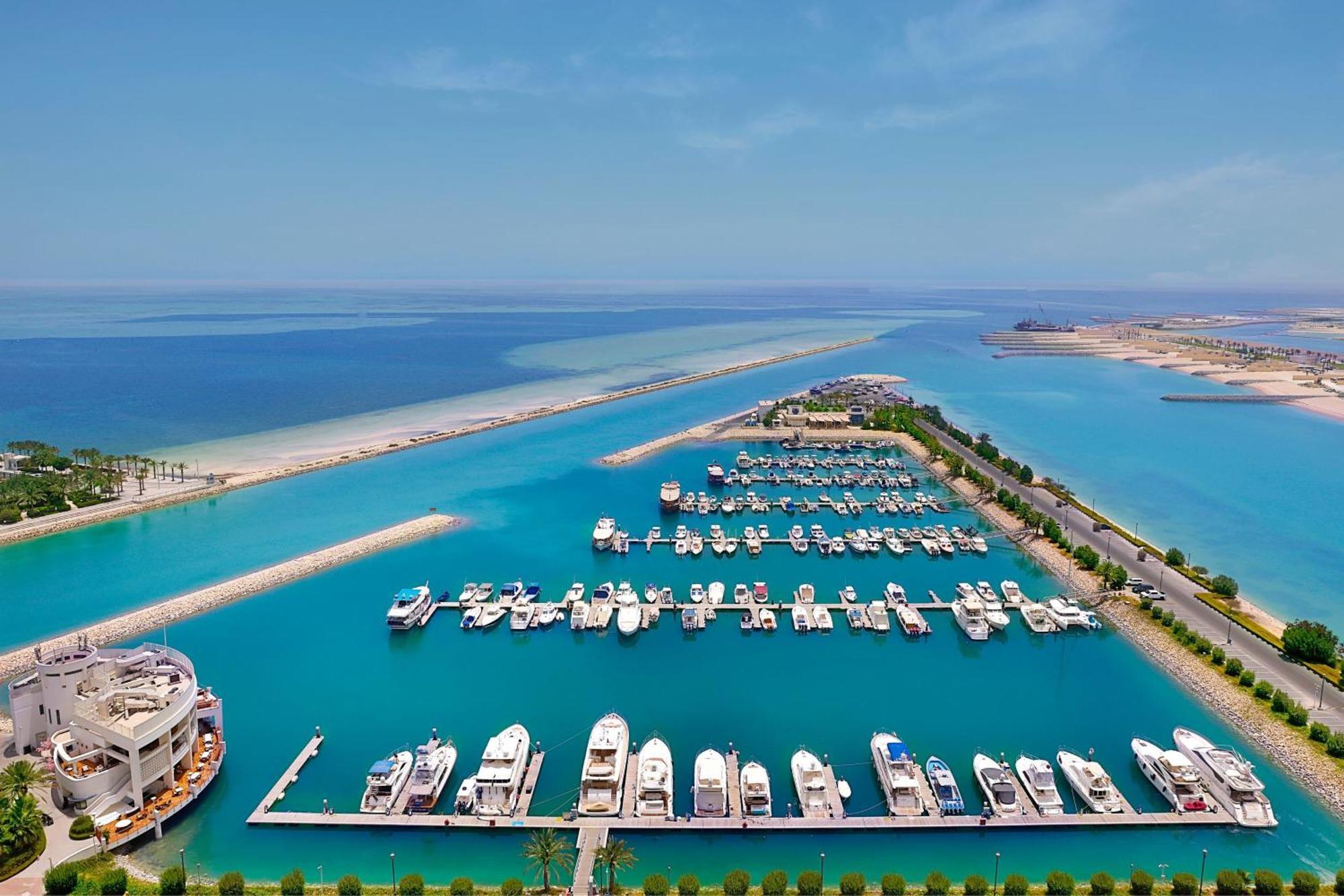 Hotel The Ritz-Carlton, Ad Dawhah Esterno foto Aerial view of the marina