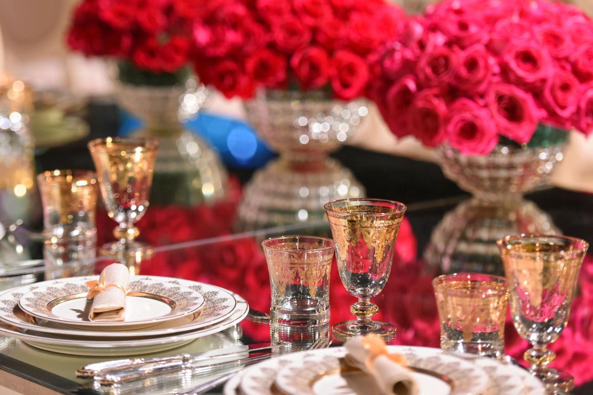 Hotel The Ritz-Carlton, Ad Dawhah Esterno foto A table set for a formal dinner
